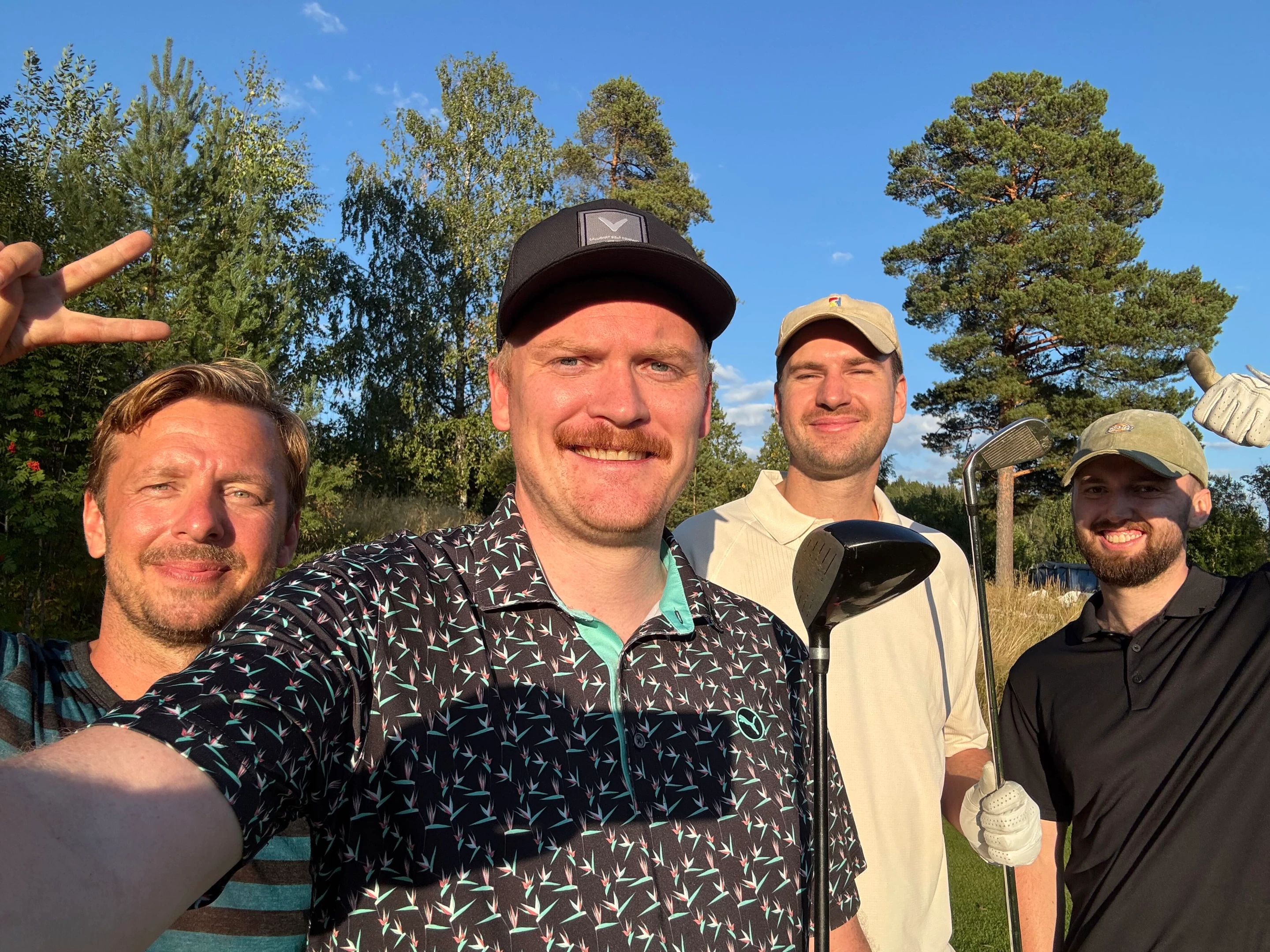 Colleagues posing together on a team trip