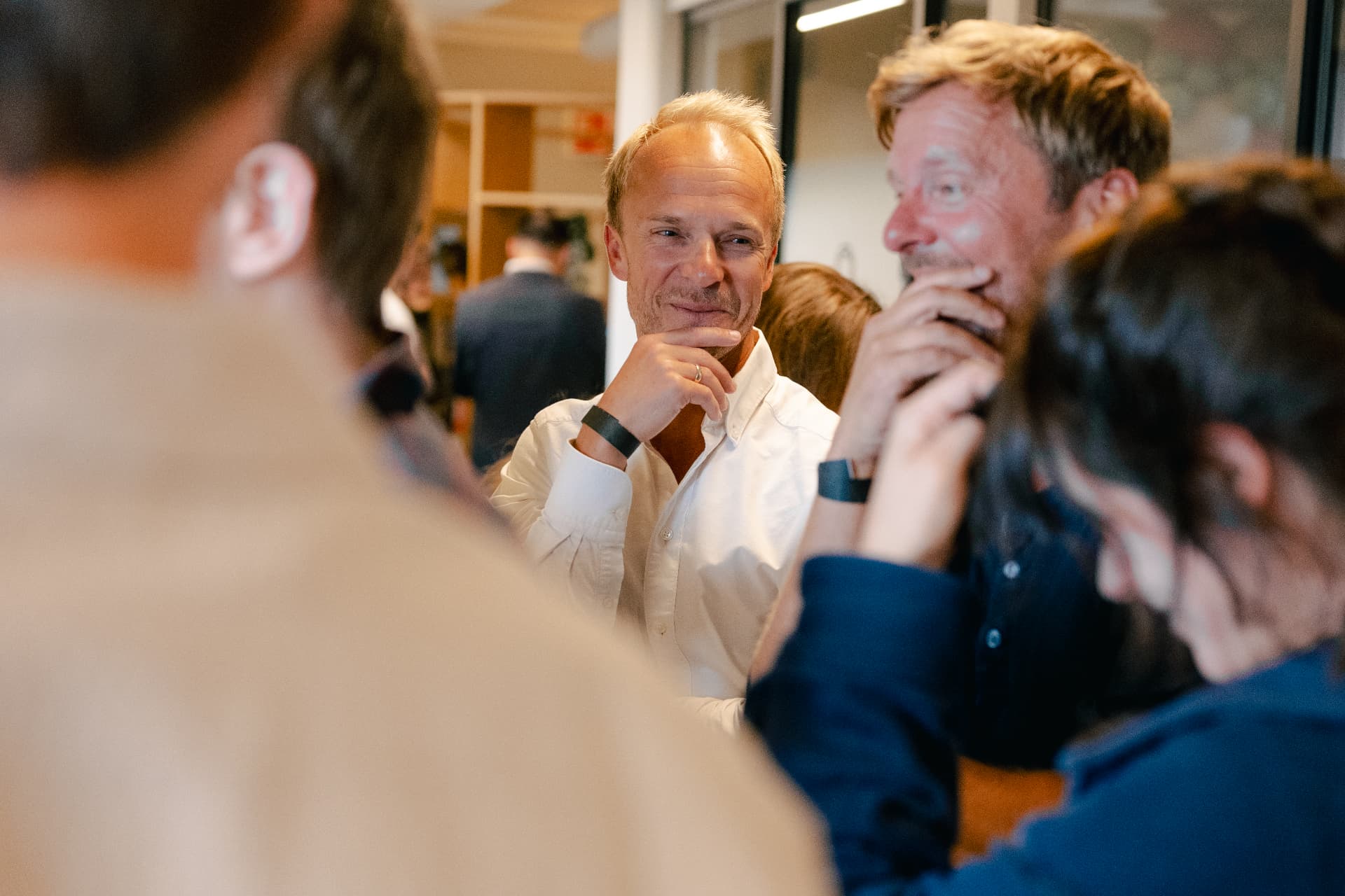 The whole Nettbureau team gathered in front of the balloon wall at the summer party in Oslo